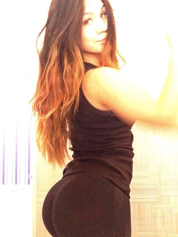 Hot Chick Showing Off Her Butt In Black